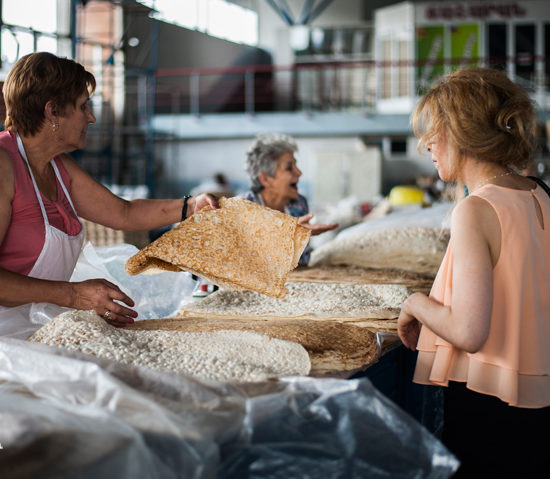 Lavash sellers at the agricultural market in Yerevan, Armenia.