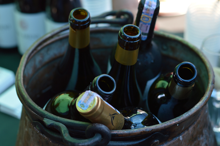 Bottles of Armenian wine in a bucket at Areni Wine Festival in Armenia.